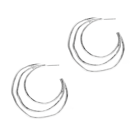 worn silver crescent moon earring