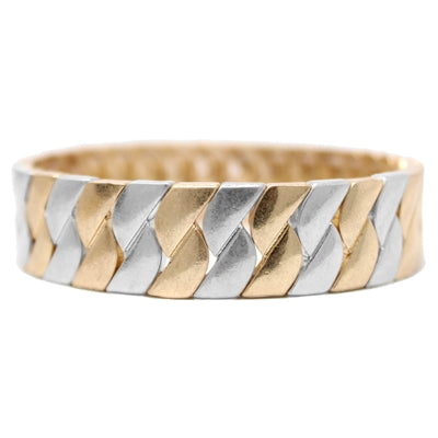 worn gold and silver textured bracelet