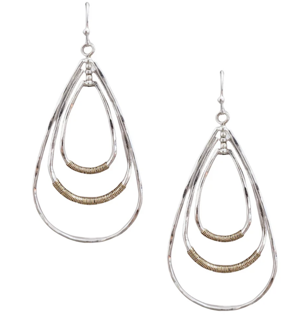 worn silver and gold teardrop earring