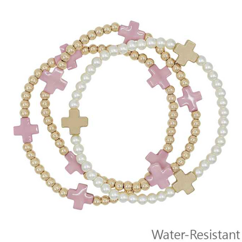 gold beaded pink cross charm bracelets