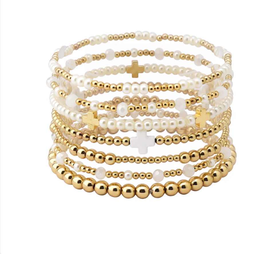 set of 7 stretch gold and white bracelets